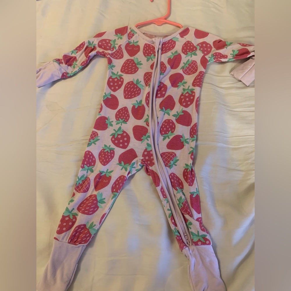 Original release little sleepies strawberry print. Light pink cuffs. Size 0-3.